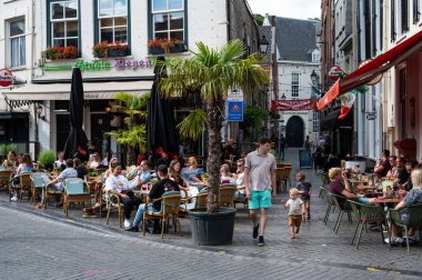 Breda, North Brabant, The Netherlands, 08 09 2022 - People enjoying the sunny terraces of old town
