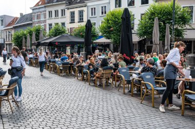 Breda, North Brabant, The Netherlands, 08 09 2022 - People enjoying the sunny terraces of old town