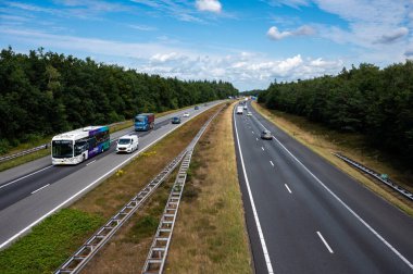Hattem, Gelderland, The Netherlands, 07 14 2022 - Traffic over the asphalt of the A50 highway