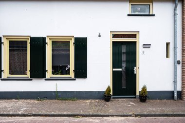 Hattem, Gelderland, The Netherlands, 07 14 2022 - Traditional facades of decorated houses