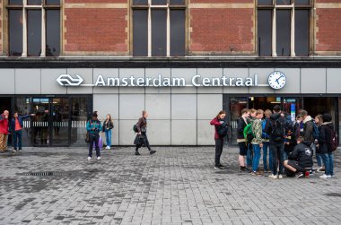 Amsterdam, North Holland, The Netherlands, 07 21 2022 - Facade and square of the Amsterdam centrail station