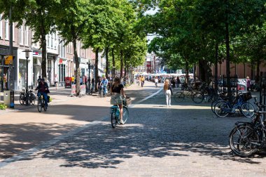 Groningen, The Netherlands, 07 20 2022 - Students walking through the streets of old town