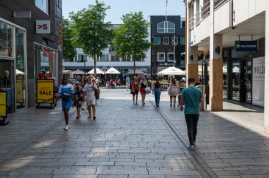 Almere, Flevoland, The Netherlands, 07 20 2022 - People of all ages walking in the shopping streets in the city center