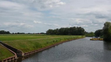 Hattem, Gelderland, The Netherlands, 07 14 2022 - The green banks of the River Ijssel