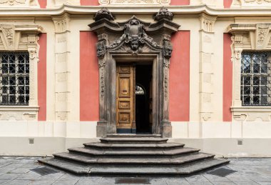 Prague - Czech Republic - 08 01 2020 Vintage wooden entrance door of the Dvorak Museum clipart