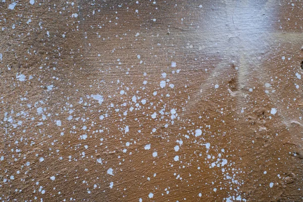 Textura castanha clara com manchas brancas e pontos semelhantes a aglomerados de estrelas — Fotografia de Stock