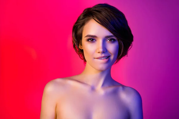 Photo of cute bob hairdo young lady bite lip isolated on vibrant neon red color background — Stockfoto