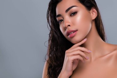 Close up photo of charming lady have bath apply new balm for silky pure facial skin isolated on grey color background.