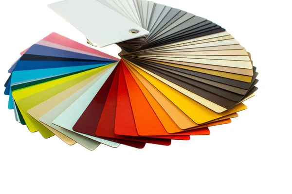 Color guide displaying a range of hues for use in interior design and decoration. Colorful color guide with palette of paint samples on white background with copy space. Catalog for tinting.