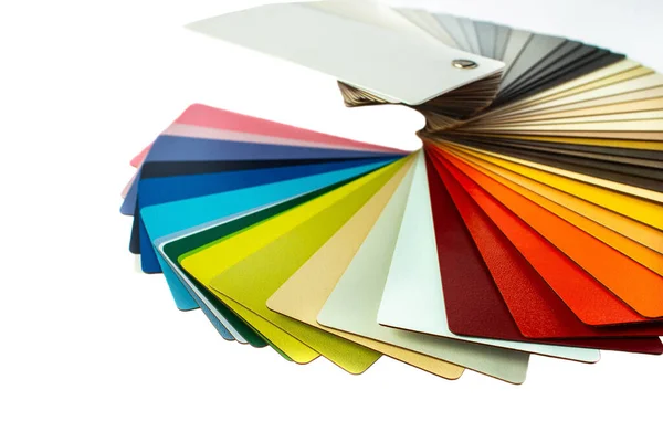 Color guide displaying a range of hues for use in interior design and decoration. Colorful color guide with palette of paint samples on white background with copy space. Catalog for tinting