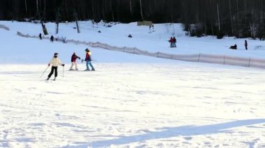 People ski on the snow slope in the winter ski resort. Ski elevator on snow mountain. Winter activity. The concept of rest, hobbies, health
