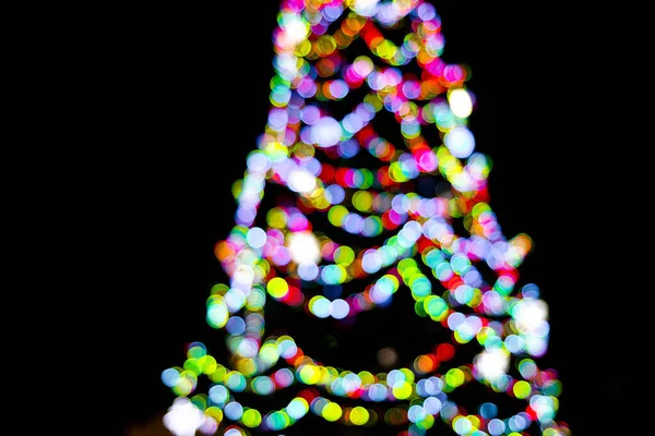 Bokeh Forma Árvore Natal Multicolorido Fundo Preto Atmosfera Natal Ano — Fotografia de Stock