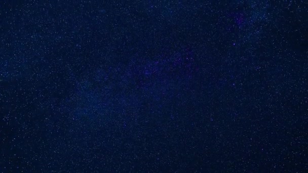 Starry night sky with shooting stars on the background of the beautiful Milky Way with many stars — Video