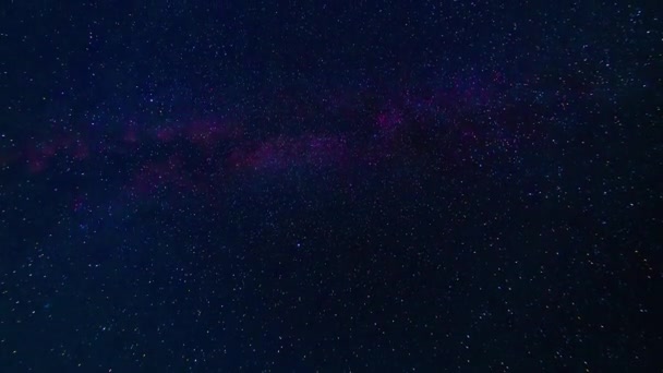 Starry night sky with shooting stars on the background of the beautiful Milky Way with many stars — Stock video