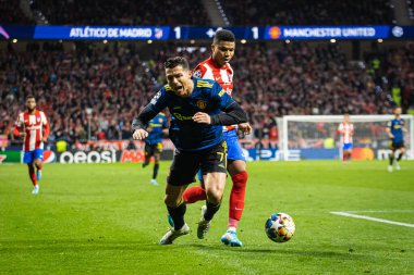 Madrid, İspanya, 23.02.2022, Uefa Şampiyonlar Ligi, Atletico De Madrid ile Manchester United arasındaki ilk turda Cristiano Ronaldo Reinildo tarafından durduruldu.