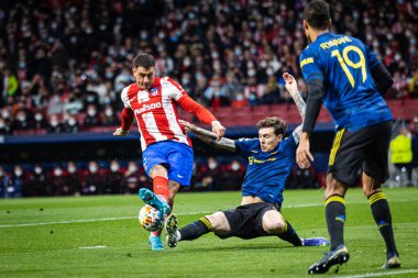 Madrid, Spain, 23.02.2022, Uefa Champions League, Round of 16 first leg between Atletico De Madrid and Manchester United; Gimenez shoots blocked by Lindelof clipart