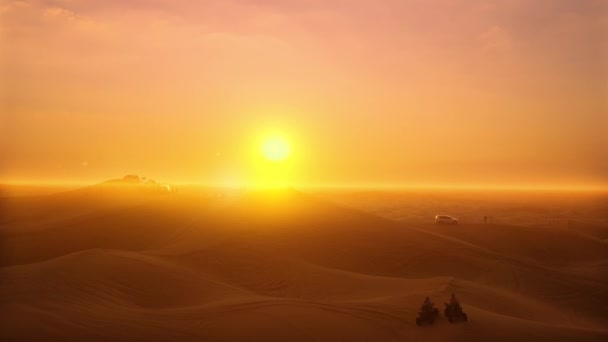 AERIAL. Group of tourists with cars stands on the deserts mountains and looks to the epic sunset. — Stock Video