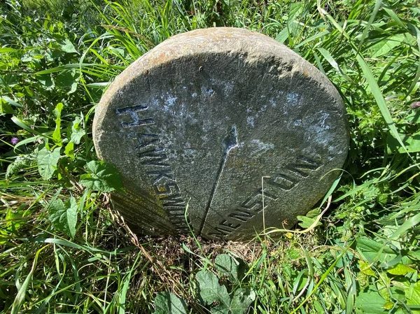 Old Stone Road Sign Partially Hidden Road Side Inscribed Hawksworth — Stock Photo, Image