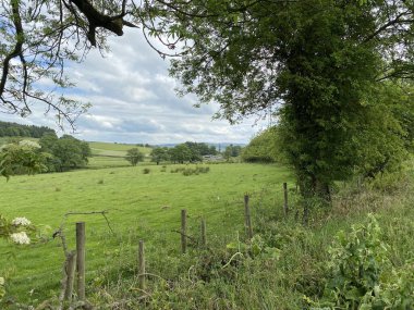 A view looking toward Embsay, from grassington road, with fields and meadows near, Skipton, Yorkshire, UK