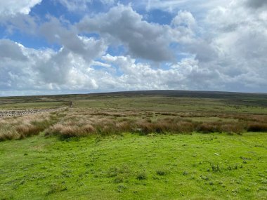 Extensive moorland landscape, with heavy clouds near, Cowling Pinnacle, Keighley, UK