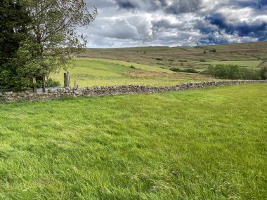 High on the hills, with fields and moorland in, Denholme, Bradford, UK