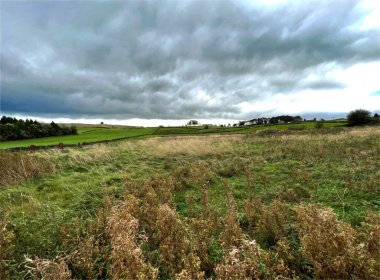 Storm clouds, gathering over the fields and hills near, Wilsden, Bradford, UK 