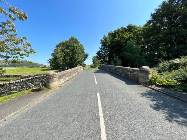 Early stone bridge, crossing over, Austwick Beck on, Graystonber Lane, Austwick, UK
