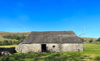 Very old stone barn, in the countryside near, Austwick, UK