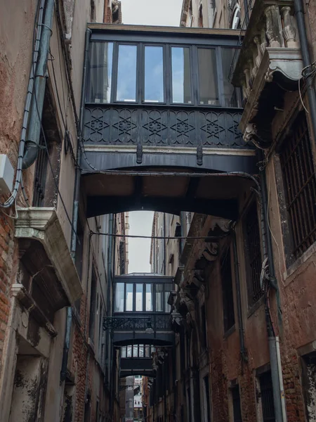Venetian lanes with bridges between houses