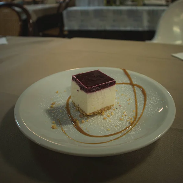 Cheesecake with fruits on a decorated plate