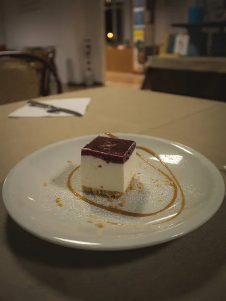 Cheesecake with fruits on a decorated plate
