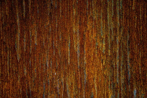 Paslı metal duvar. Metal yüzeyde paslı noktalar var. Metal pas dokusu arka planı. Paslı. Pas lekeleri..