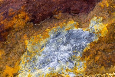 Kırsal taşlar, paslanmış dokular, renkli ve ilginç arka planlar ve büyüleyici dokular, web tasarımı ve soyut arkaplanlar için kullanılır.