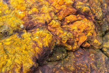 Kırsal taşlar, paslanmış dokular, renkli ve ilginç arka planlar ve büyüleyici dokular, web tasarımı ve soyut arkaplanlar için kullanılır.