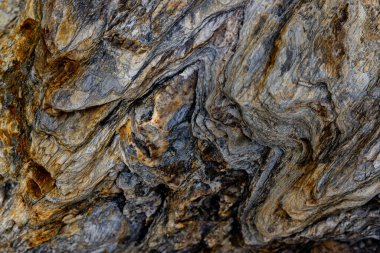 Kırsal taşlar, paslanmış dokular, renkli ve ilginç arka planlar ve büyüleyici dokular, web tasarımı ve soyut arkaplanlar için kullanılır.