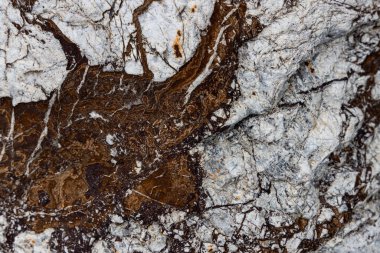 Kırsal taşlar, paslanmış dokular, renkli ve ilginç arka planlar ve büyüleyici dokular, web tasarımı ve soyut arkaplanlar için kullanılır.