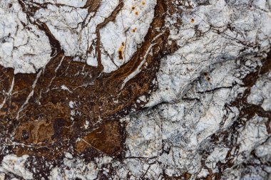 Kırsal taşlar, paslanmış dokular, renkli ve ilginç arka planlar ve büyüleyici dokular, web tasarımı ve soyut arkaplanlar için kullanılır.