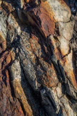 Kırsal taşlar, paslanmış dokular, renkli ve ilginç arka planlar ve büyüleyici dokular, web tasarımı ve soyut arka plan için kullanılır.