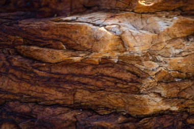 Kırsal taşlar, paslanmış dokular, renkli ve ilginç arka planlar ve büyüleyici dokular, web tasarımı ve soyut arka plan için kullanılır.