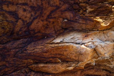 Kırsal taşlar, paslanmış dokular, renkli ve ilginç arka planlar ve büyüleyici dokular, web tasarımı ve soyut arka plan için kullanılır.