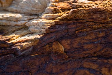 Kırsal taşlar, paslanmış dokular, renkli ve ilginç arka planlar ve büyüleyici dokular, web tasarımı ve soyut arka plan için kullanılır.