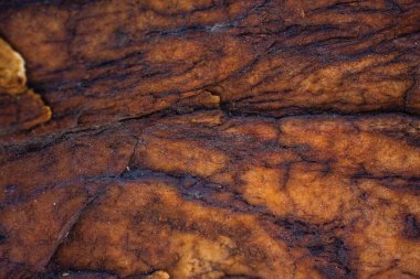 Kırsal taşlar, paslanmış dokular, renkli ve ilginç arka planlar ve büyüleyici dokular, web tasarımı ve soyut arka plan için kullanılır.