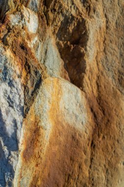 Kırsal taşlar, paslanmış dokular, renkli ve ilginç arka planlar ve büyüleyici dokular, web tasarımı ve soyut arka plan için kullanılır.