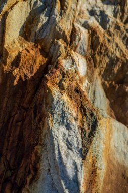 Kırsal taşlar, paslanmış dokular, renkli ve ilginç arka planlar ve büyüleyici dokular, web tasarımı ve soyut arka plan için kullanılır.