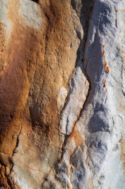 Kırsal taşlar, paslanmış dokular, renkli ve ilginç arka planlar ve büyüleyici dokular, web tasarımı ve soyut arka plan için kullanılır.