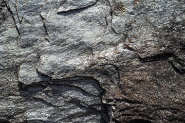 Kırsal taşlar, paslanmış dokular, renkli ve ilginç arka planlar ve büyüleyici dokular, web tasarımı ve soyut arka plan için kullanılır.