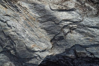 Kırsal taşlar, paslanmış dokular, renkli ve ilginç arka planlar ve büyüleyici dokular, web tasarımı ve soyut arka plan için kullanılır.