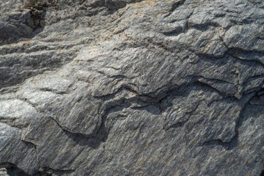 Kırsal taşlar, paslanmış dokular, renkli ve ilginç arka planlar ve büyüleyici dokular, web tasarımı ve soyut arka plan için kullanılır.