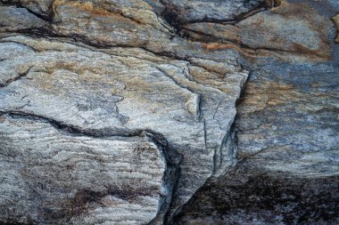 Kırsal taşlar, paslanmış dokular, renkli ve ilginç arka planlar ve büyüleyici dokular, web tasarımı ve soyut arka plan için kullanılır.