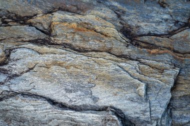 Kırsal taşlar, paslanmış dokular, renkli ve ilginç arka planlar ve büyüleyici dokular, web tasarımı ve soyut arka plan için kullanılır.